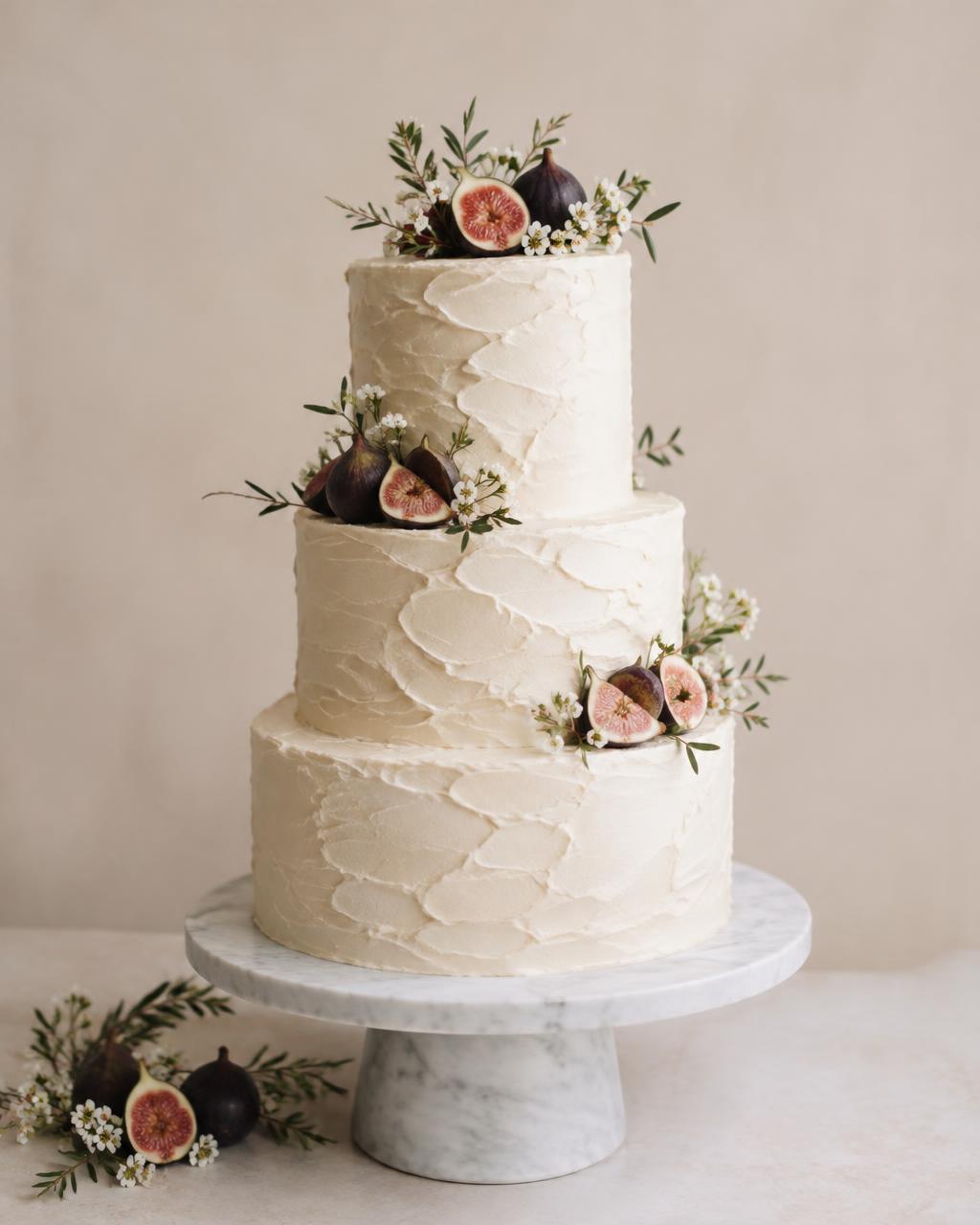 Textured buttercream tiers with figs