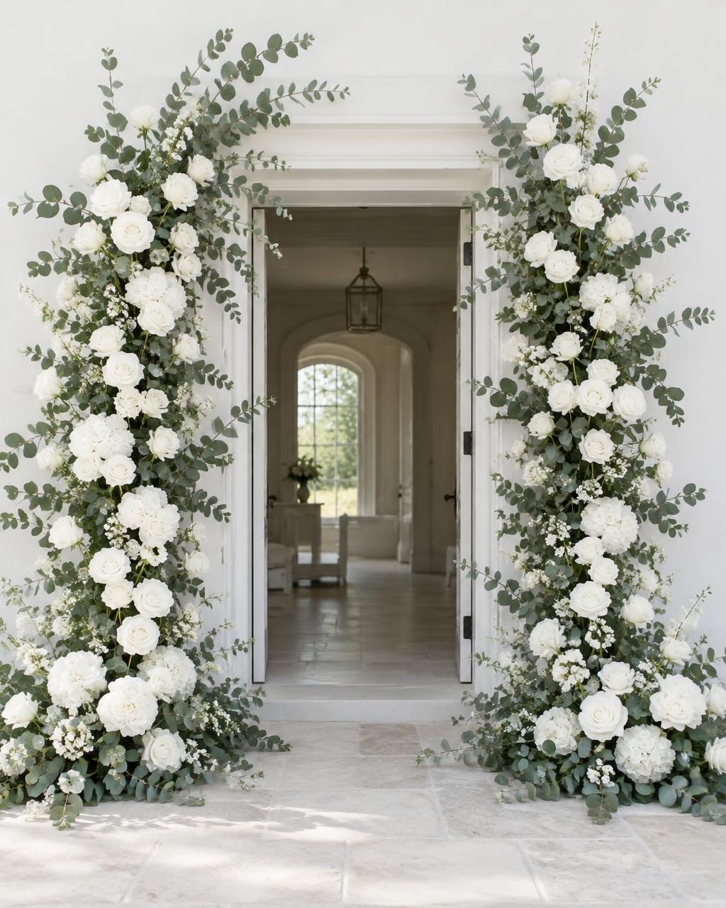 White rose and eucalyptus doorway installation